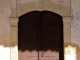 Le portail du porche sud de l'église Saint Romain de Mazérac.