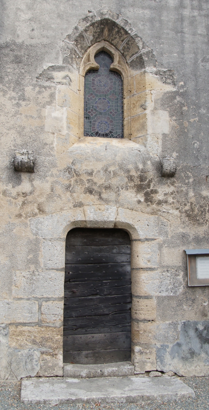 Portail sud de l'église Saint Hilaire. - Puynormand