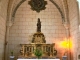 Photo suivante de Saint-Genès-de-Lombaud La Vierge noire domine au centre du choeur.
