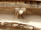 Photo suivante de Targon Modillon sculpté au dessus de portail de l'église Saint Romain.