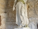 Statue de Jeanne d'Arc qui se trouve à gauche du portail de l'église de Saint-Pierre.