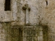 Photo suivante de La Sauvetat-du-Dropt Croix contre la façade nord de l'église Saint Germain