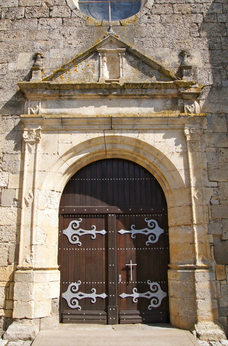 Le portail de l'église Saint-Jean-Baptiste. - Prayssas