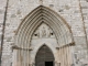 Photo suivante de Villeréal Le portail de l'église Notre Dame.