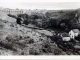 Photo suivante de Néris-les-Bains Les moulins et le Viaduc, vers 1920 (carte postale ancienne).