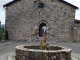 Photo suivante de Montmurat la fontaine devant l'église