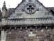 Photo suivante de Vic-sur-Cère les modillons sur la façade de l'église