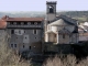 Photo suivante de Saint-Dier-d'Auvergne Eglise St Didier de dos