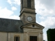 Le clocher et le portail de l'église paroissiale Saint Barthélémy.