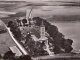 Photo précédente de Thaon Église avec côté gauche emplacement  du  baraquement   ayant servi  d'église  provisoire1955