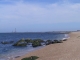 Gouberville,la plage avec vue sur le phare de Gatteviie