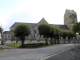 Photo suivante de Saint-Sauveur-Lendelin petite place devant la grande église