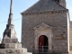 Photo suivante de Marigny-l'Église La croix sur la place devant l'Eglise de Marigny
