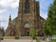 Photo suivante de Pleurtuit L'église Saint Pierre. Dessinée en 1867 et réaliée après la guerre de 1870. plusieurs éléments du XIIe et XIVe siècle provenant de l'ancienne église ont été réemployés.