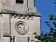 Photo suivante de Le Menoux Horloge du clocher de l'église Notre Dame.