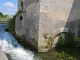 Photo suivante de Saint-Genou L'ancien Grand Moulin sur le canal.