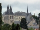 Photo suivante de Blois le château derrière les flèches de l'église Saint Nicolas