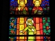 Photo suivante de Menneval Vitrail de Décorchemont : La Trinité et la Vierge qui étend la main sur l'église