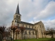 L'église paroissiale Saint Martin. Les murs sont scandés d'ouvertures en plein cintre, de contreforts et coiffés d'un toit à longs pans en ardoise.