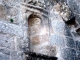 Photo suivante de Saint-Angel Petite niche, vide, au dessus du portail de l'église fortifiée.