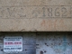 Photo précédente de Saint-Germain-Lavolps Inscription sur le linteau de porte d'une dépendance du château.