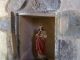 Photo suivante de Saint-Sornin-Lavolps Eglise Saint-Saturnin : niche sculpté.