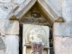 Photo suivante de Vigeois a-droite-de-la-porte-polylobee-statue-de-saint-paul-abbatiale-saint-pierre