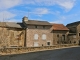 Photo précédente de Comps-la-Grand-Ville Maisons du village autour de l'église Notre DAme.