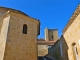 Dans le hameau de Rouillac : le chevet de l'église et la tour du château