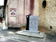 Photo suivante de Rieumajou Monument aux morts et Blason du village