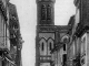 Rue louis Pernon et l'église, début XXe siècle (carte postale ancienne).