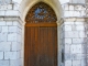 Le portail de l'église de Couloussac.