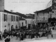 Photo suivante de Montaigu-de-Quercy place de la Mairie, début Xxe siècle (carte postale ancienne).