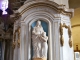Photo suivante de Azé Retable de la nef du XIe siècle. Statue représentant Sainte Anne et Joachin. Eglise Saint Saturnin.