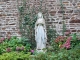 Photo suivante de La Haie-Traversaine La Statue de la Vierge contre la façade nord de l'église de la Sainte Vierge.