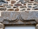 Photo suivante de La Haie-Traversaine Joli linteau en granit sculpté.