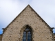 Photo suivante de Oisseau Transept droit avec ses gargouilles en forme de chien. Eglise Saint Pierre.