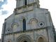 Photo précédente de Maillezais Façade occidentale de l'église Saint Nicolas : en 3 parties verticales et deux niveaux, séparée par une corniche à modillons.