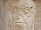 Photo suivante de Maisonnay Détail du portail, visage humain, église ND