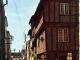 Photo précédente de Thouars La rue du Château et le Syndicat d'Initiative (carte postale de 1962)