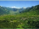 Panorama sur la vallée de la Durance. Au fond la massif des Ecrins. (carte postale de 1990)