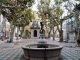 Photo suivante de Collobrières place de la Libération : fontaine et mairie