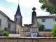 Photo suivante de Pressiat L'église et le Monument-aux-Morts