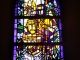 vitrail de l'église de Thusy représentant le baptême du Christ