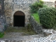 Photo suivante de Montverdun Passez cette prte et entrez dans la cave du 13ème siècle, la seule visitable du site... Creusée dans la roche et le basalte, de taille régulière ...