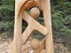 Photo suivante de Aussois Sculpture sur pied de Serge Couvert dans la forêt d'Aussois ( Monolithe )